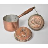 Two Copper Wall Hanging Continental Moulds Together with a Copper Saucepan, 13cm Diameter