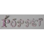 A Collection of Jewelled Letter Pendants or Charms spelling 'Poppet'