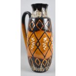 A Tall German Lava Glazed Jug in Brown and Black Enamels, 46.5cm High