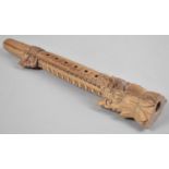 A Far Eastern Carved Wooden Musical Instrument, 33.5cms High