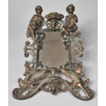 An Edwardian Ornate Wall Hanging Mirror Decorated with Seated Cherubs and Pegasus Winged Horses,
