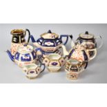 A Collection of Various Imari Decorated Teapots, Stand, Hot Water Jug Etc