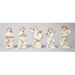 A Collection of Five Naples Cherub Band Figures