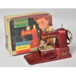 A Vintage Boxed Vulcan Senior Child's Sewing Machine