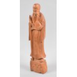 A Carved Wooden Chinese Figure of an Elder Holding Staff, 30cm high