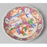 An 18th Century Chinese Saucer in the Mandarin Pallette Depicting Family Scene, Glued, 12.5cm