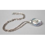 A Silver Mounted Ammonite Shell on Silver Chain with Topaz Stone Mount