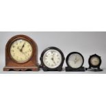 A Collection of Three Vintage Clocks and a Barometer