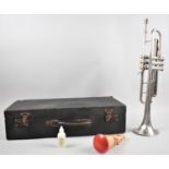 A Cased French Trumpet by Couesnon & Co.