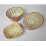 A Graduated Collection of Three Salt Glazed Late Victorian Jelly Moulds, the Largest 16cm Long