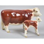 A Beswick Hereford Cow and Beswick Hereford Calf