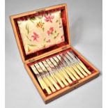 An Edwardian Cased Set of Eleven Fruit Knives and Twelve Forks by Walker and Hall