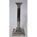 A Sheffield Plated Corinthian Column Candlestick on Square Base with Reeded Support, 30cms High