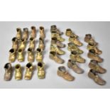 A Collection of Various Brass Shoe Ornaments