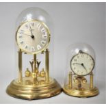 One Large and One Small Mid 20th Century Brass Pillar Clocks with Glass Domes