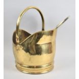 A Modern Brass Helmet Shaped Coal Scuttle with Brush