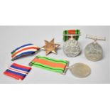 A Collection of Four WWII Medals to Include 1939-1945, The Defence Medal x2 and The France and