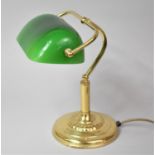 A Reproduction Brass and Green Opaque Glass Desk Lamp