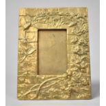 A Rectangular Brass Photo Frame Decorated in Relief with Flowers, Insects Etc, Easel Back, 17x13cms