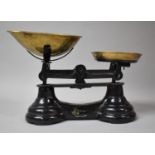 A Pair of Black Painted Librasco Kitchen Scales with Brass Pans