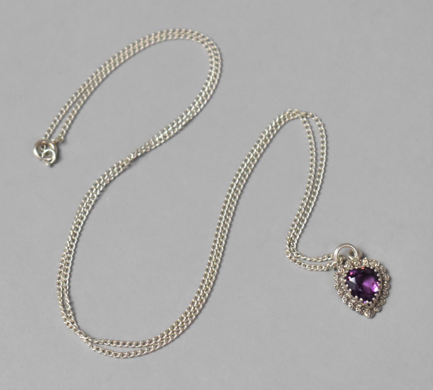 A Charles Horner Silver and Amethyst Heart Shaped Pendant on Fine Silver Chain, Hallmarked for