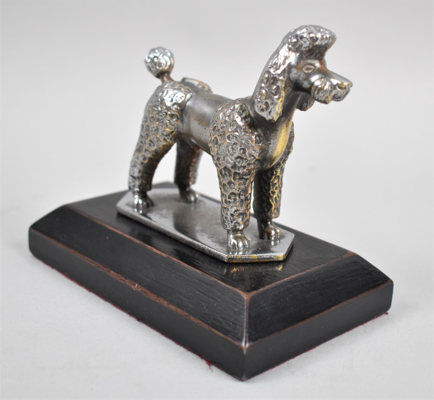A Mid 20th Century Silver Plated Study of a Show Poodle on Ebonised Wooden Rectangular Plinth,