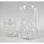 A Cut Glass Water Jug and a Lidded Preserve Pot