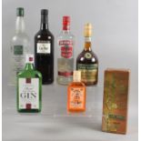 A Collection of Six Bottles to Include Brandy, Vodka, Sherry, Gin and Kumquat Liqueur
