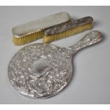 A Collection of Three Silver Mounted Dressing Table Items to Include Two Brushes and a Mirror (Glass