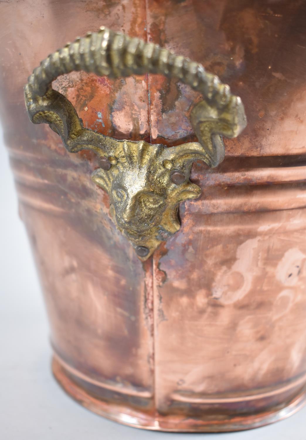 A Reproduction Copper Wine Cooler with Brass Mask Handles, 23cm Diameter and 21cm high - Image 2 of 2