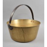 A Large Vintage Brass Jam Kettle with Iron Loop Handle, 32cm Diameter