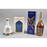 A Bottle of Martell Cognac in Cardboard Carton and Full Wade Bells Decanter to Commemorate Birth