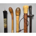 A Collection of Five Vintage Canes to Include Indian Sword Stick, African Hardwood Example etc