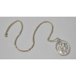 A Large Pierced Silver St. Christopher Medallion on 65cm Silver Chain