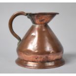 A Late 19th Century Copper Half Pint Measuring Jug