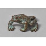 A Green Patinated Bronze Stuy of a Toad, 5cm Long