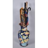 A Large Ceramic Decorative Vase, AF, Together with a Collection of Various Umbrellas, Walking Sticks