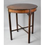 An Edwardian Circular Mahogany Occasional Table with Carved Border and Cross Stretcher, 60cm
