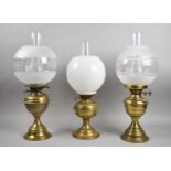 A Collection of Three Vintage Brass Based Oil Lamps