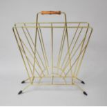 A 1960s Wall Magazine Rack with Sunburst Stylised Decoration, 51cms High