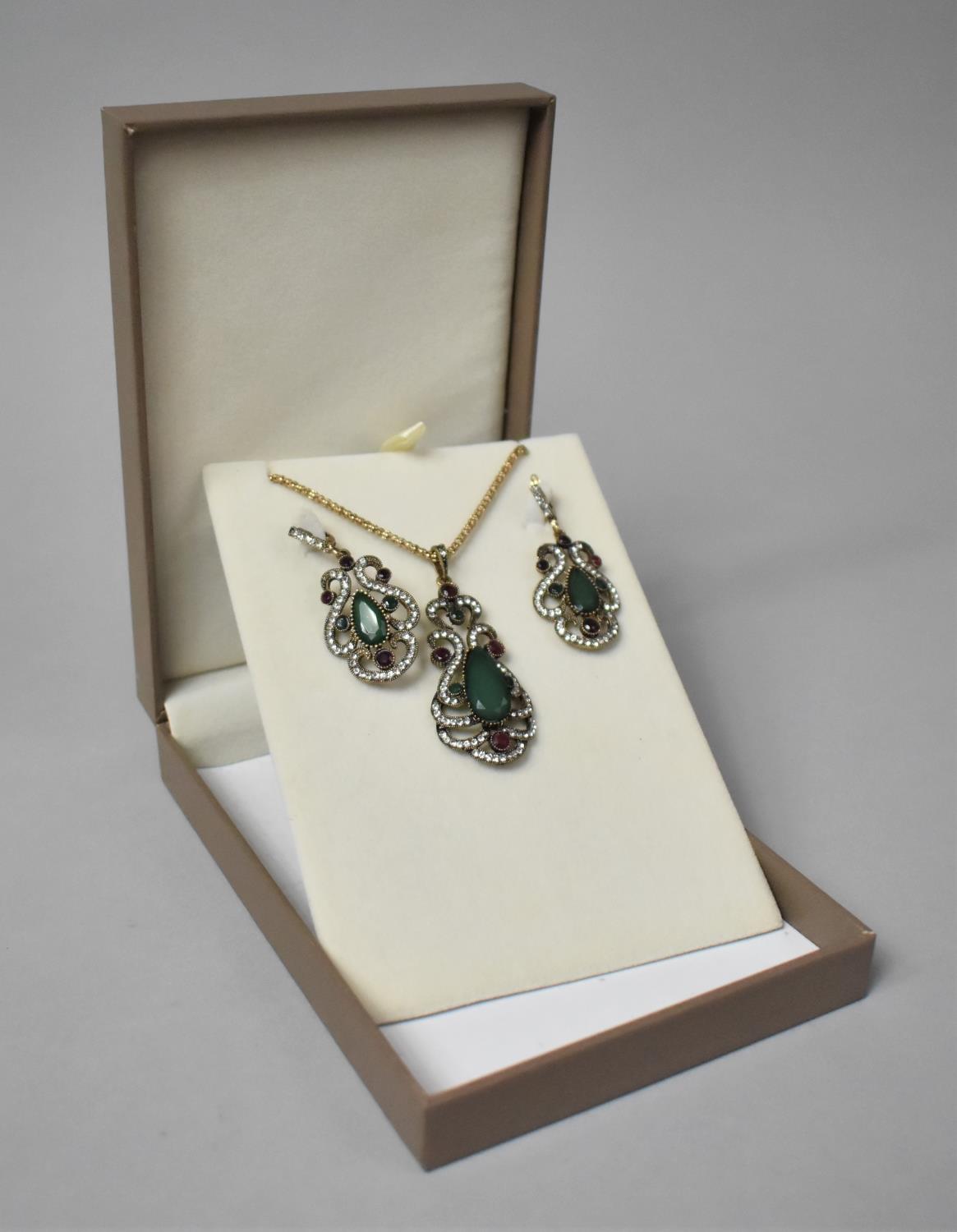 A Jewelled Suite Comprising Pendant on Chain and Pair of Matching Earrings