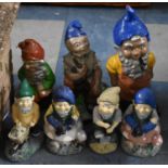 A Collection of Seven Painted Garden Gnomes, Tallest 38cm high