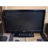 A Sharp 21" TV with Remote