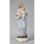 A Continental Cold Painted Bisque Altar Figure of Mary Holding Jesus, 39cm high