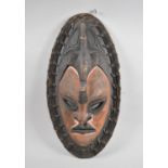 A Vintage Carved Wooden Spirit Mask with Woven Border, 55cm High