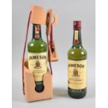 Two Bottles of Jameson Irish Whiskey, One Set in Wooden Puzzle Tantalus