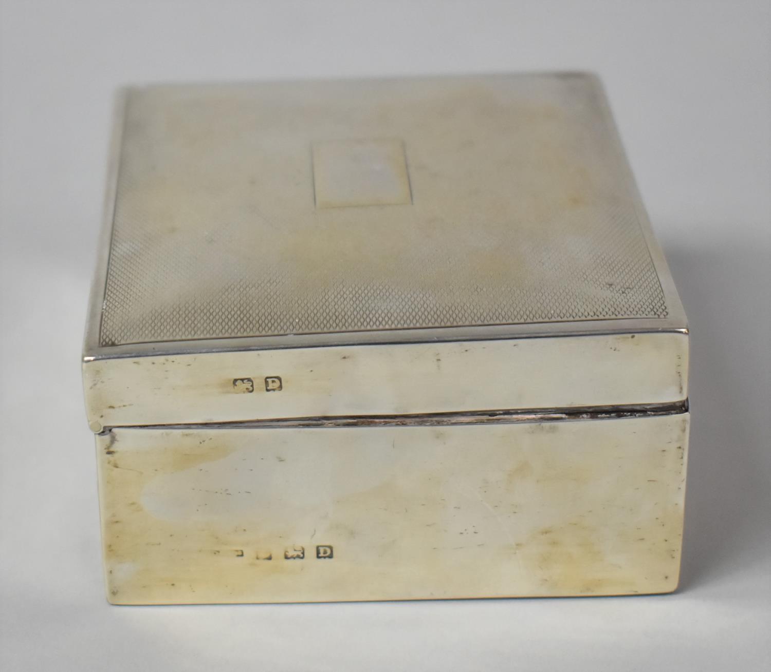 A Silver Cigarette Box with Engine Turned Decoration to Hinged Lid, 10cm wide - Image 2 of 3