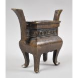 A Chinese Bronze Censer on Quadrant Supports with Twin Handle and Decorated with Greek Key Frieze to