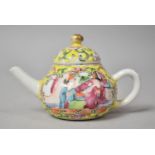 A Miniature Chinese Famille Rose Teapot Decorated with Figural and Bird Cartouches on Yellow Ground,