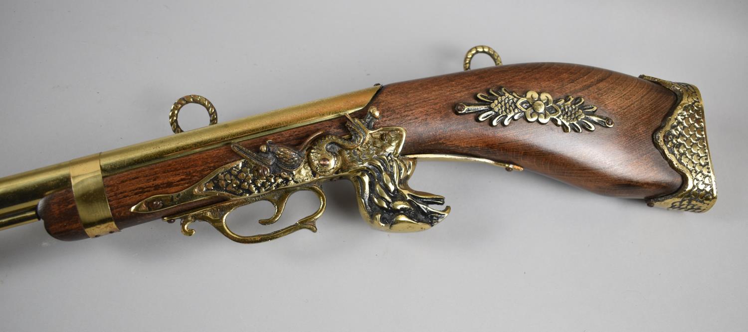 A Mid 20th Century Reproduction Brass Mounted Wall Hanging Flintlock Rifle, 107cm long - Image 2 of 3